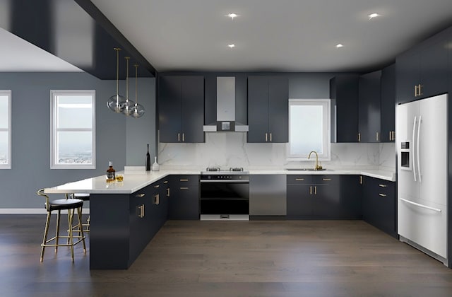 kitchen with kitchen peninsula, backsplash, white fridge with ice dispenser, wall chimney range hood, and a kitchen breakfast bar