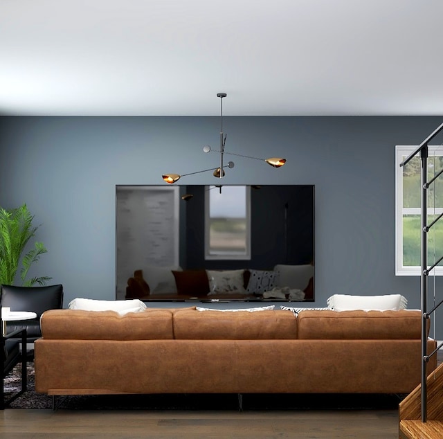 living room featuring a chandelier and hardwood / wood-style floors