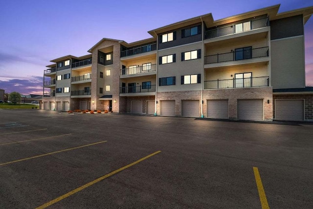 view of outdoor building at dusk