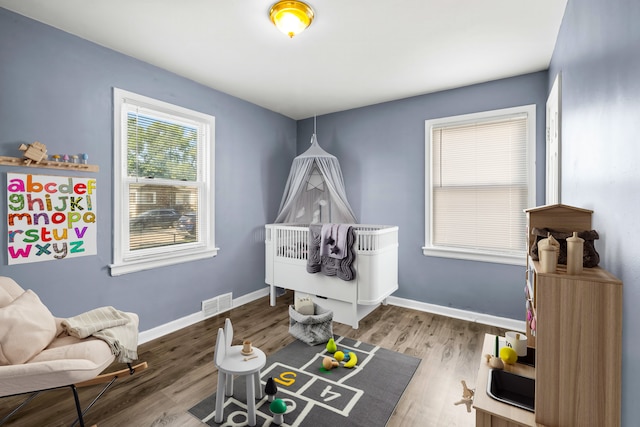 game room featuring hardwood / wood-style flooring