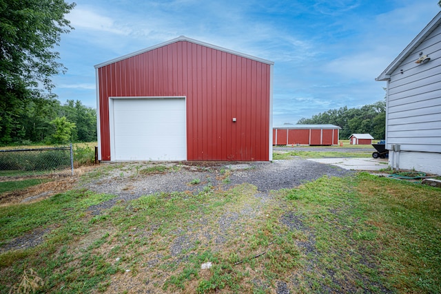 view of side of home with a yard