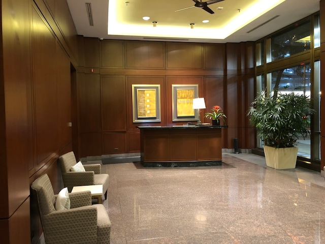 reception area with ceiling fan