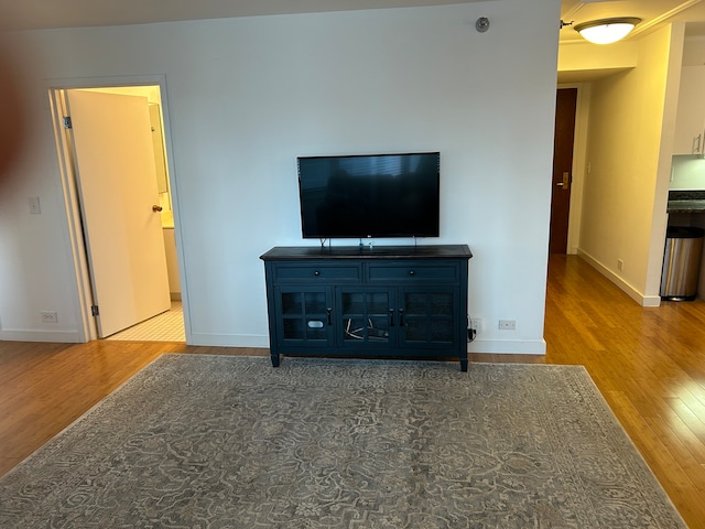 unfurnished living room featuring hardwood / wood-style floors