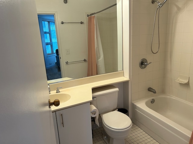 full bathroom with vanity, shower / tub combo, toilet, and tile patterned flooring