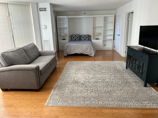 bedroom featuring hardwood / wood-style floors