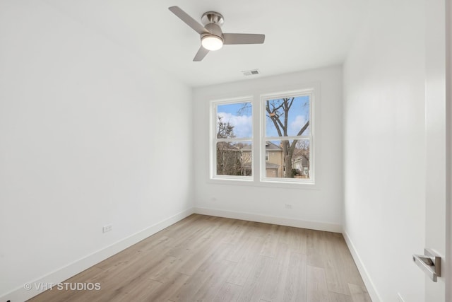 unfurnished room featuring light hardwood / wood-style floors and ceiling fan