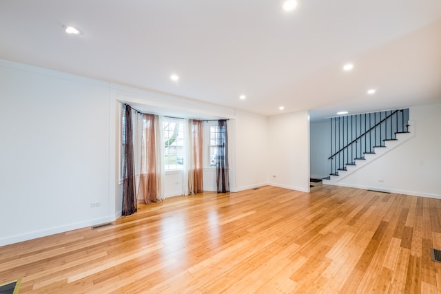 empty room with light wood-type flooring