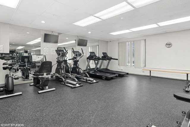 gym with a drop ceiling