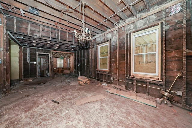 miscellaneous room featuring a chandelier