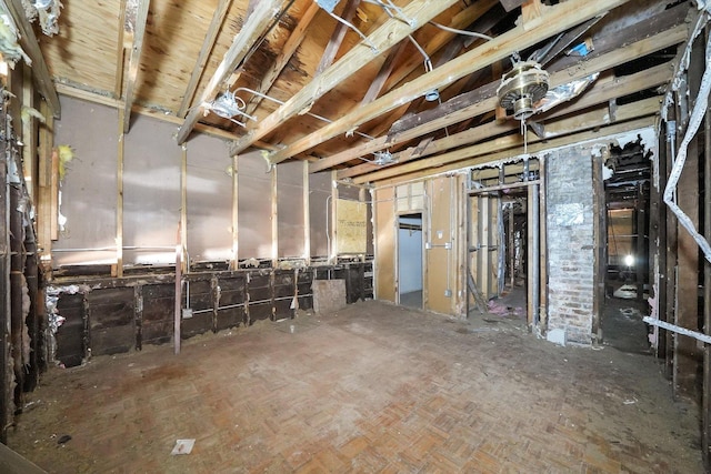 basement featuring parquet floors