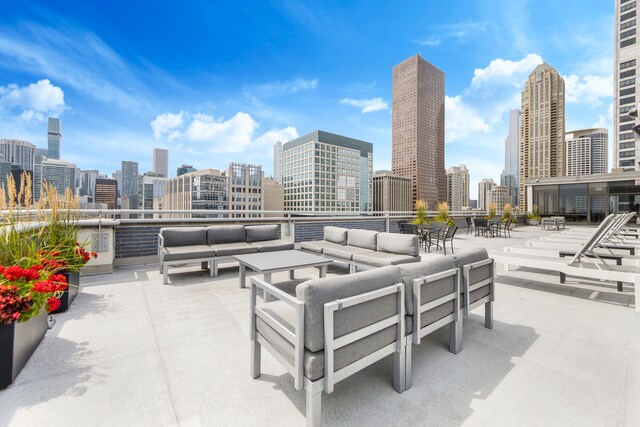 view of terrace with an outdoor living space