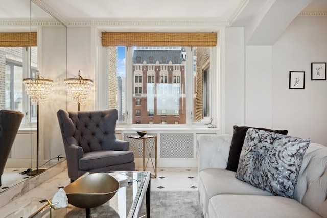 living area with a chandelier, ornamental molding, and light tile floors