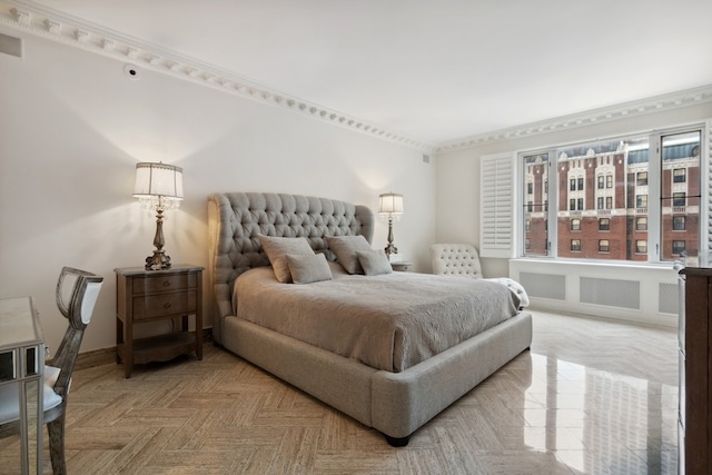 bedroom featuring parquet flooring, radiator, and ornamental molding