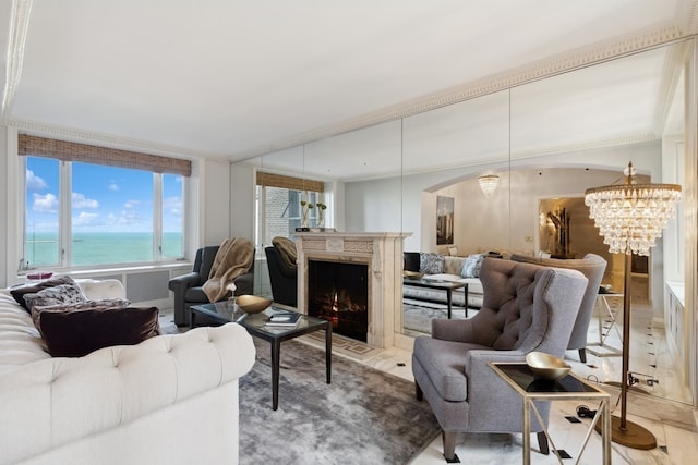 tiled living room featuring a water view and an inviting chandelier