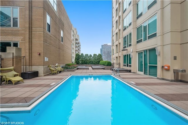 view of pool with a patio