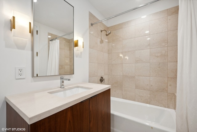 bathroom with shower / bathtub combination with curtain and vanity