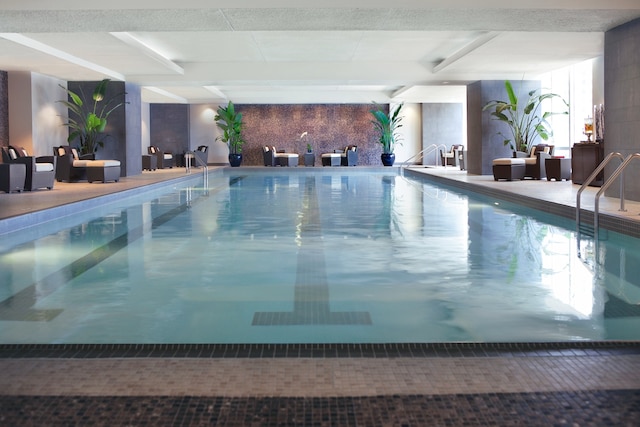 view of swimming pool with a patio area