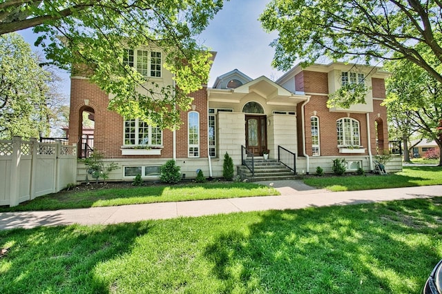 view of front of property with a front lawn