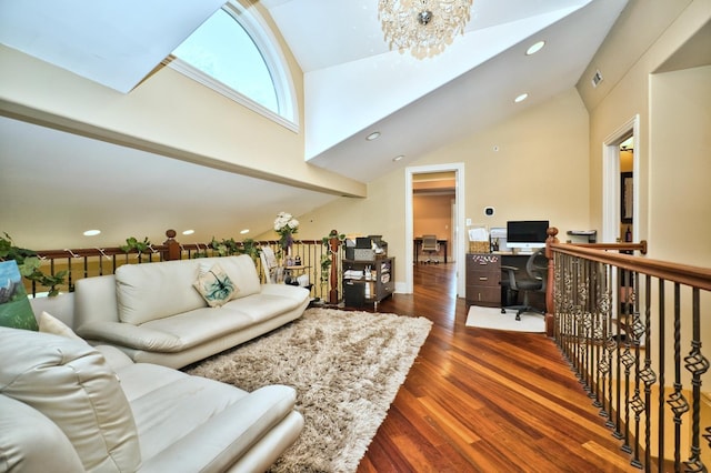 living room with dark hardwood / wood-style flooring, high vaulted ceiling, and a notable chandelier