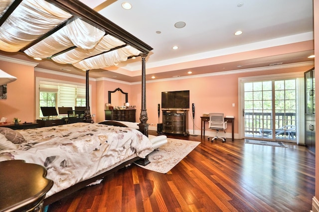 bedroom with access to exterior, hardwood / wood-style floors, multiple windows, and crown molding