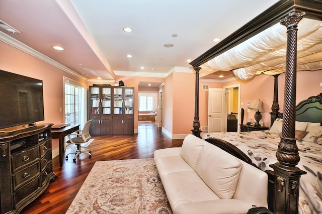 bedroom with dark wood-type flooring and ornamental molding