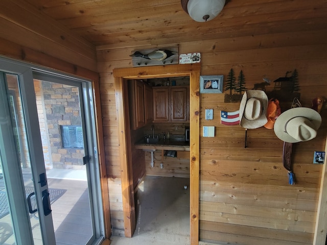 interior space featuring wooden walls