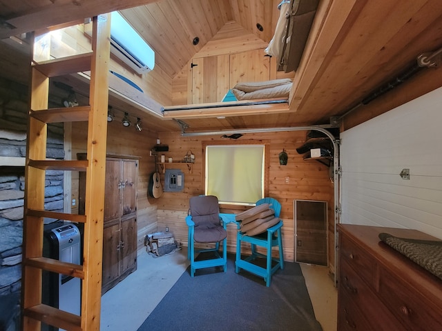 interior space with a wall mounted AC, wooden walls, lofted ceiling, and wood ceiling