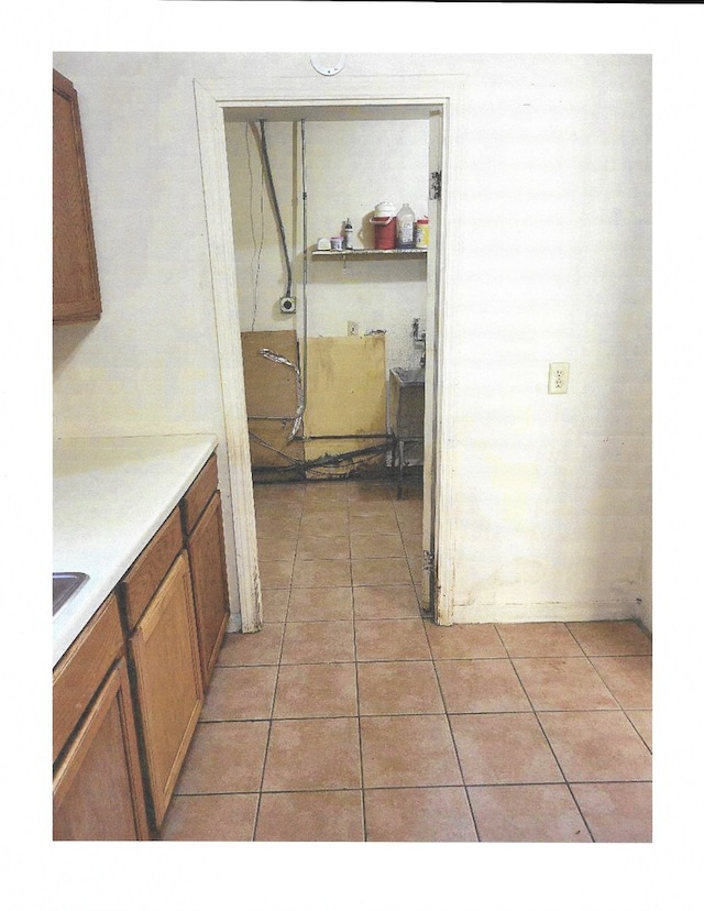 kitchen with light tile patterned floors