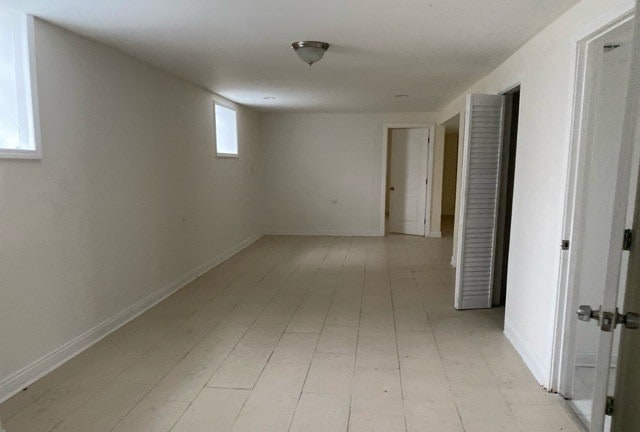 hallway with light tile flooring