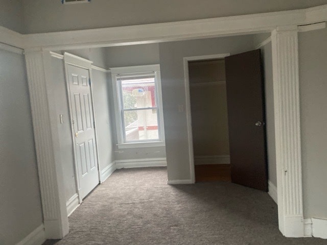 unfurnished bedroom featuring carpet flooring