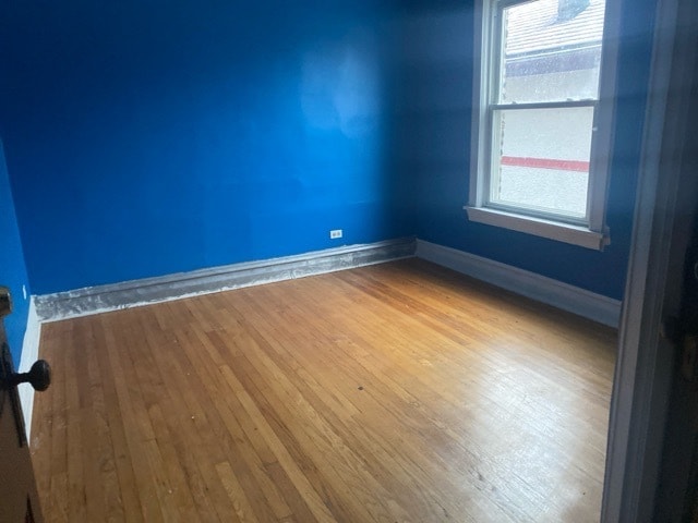 empty room featuring hardwood / wood-style floors