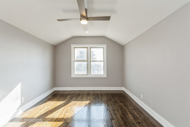 bonus room with lofted ceiling, ceiling fan, and hardwood / wood-style flooring