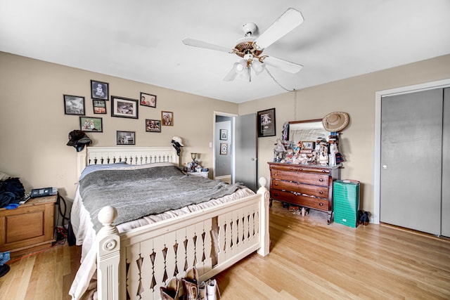 bedroom featuring hardwood / wood-style floors and ceiling fan