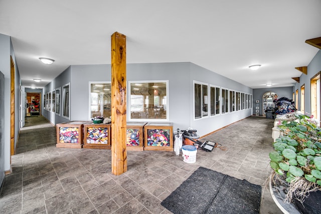 recreation room with tile floors