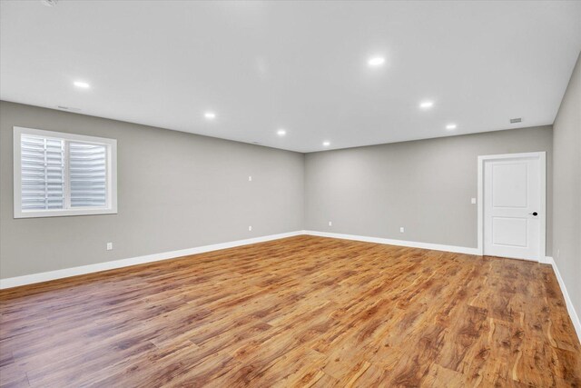 spare room featuring light hardwood / wood-style flooring