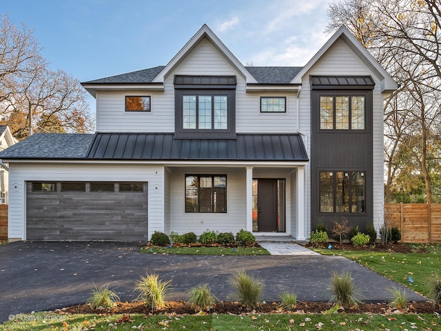 modern farmhouse style home with a garage