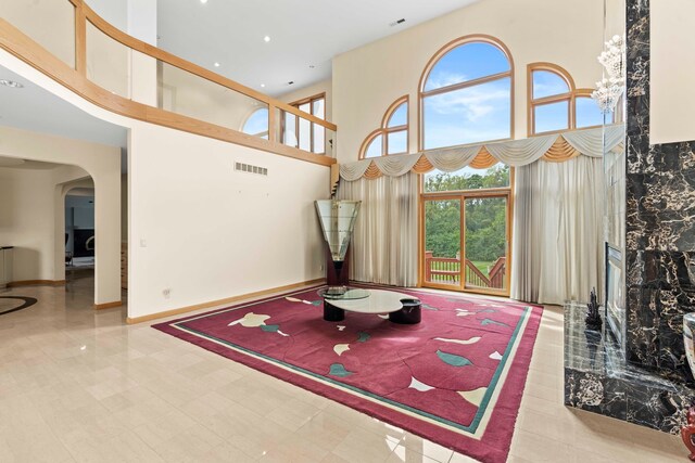 living room featuring a high ceiling