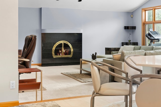 tiled living room with lofted ceiling