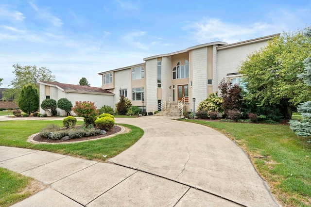 view of front of home with a front yard