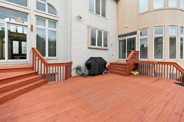 wooden deck with area for grilling