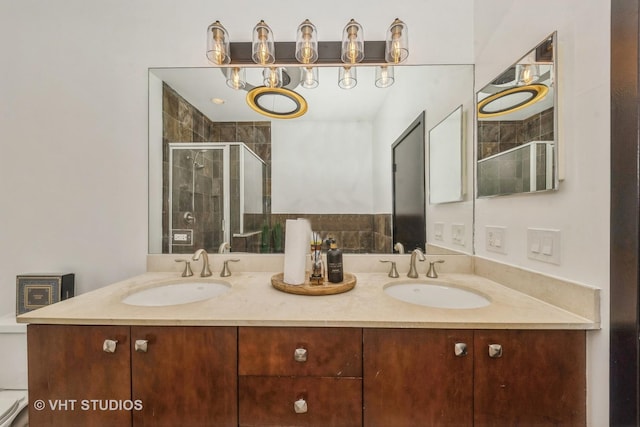 834 E 45th St, Chicago, IL 60653 - bathroom featuring a stall shower and double vanity