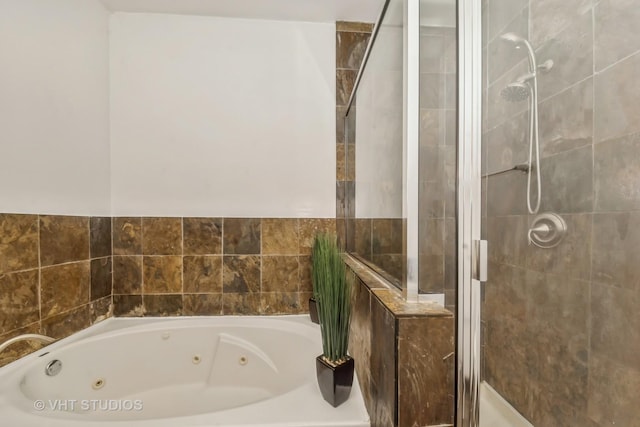 834 E 45th St, Chicago, IL 60653 - full bath with a stall shower and a tub with jets