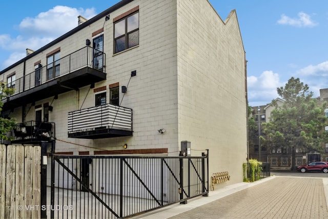 view of home's exterior featuring a balcony