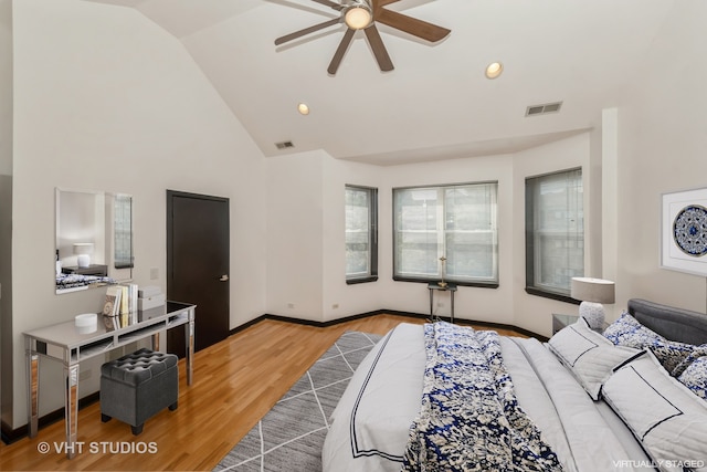 bedroom featuring vaulted ceiling, ceiling fan, and hardwood / wood-style floors