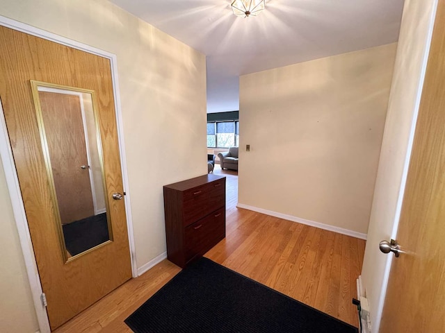 hallway featuring light wood-type flooring