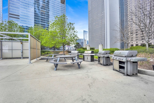 view of patio featuring a grill