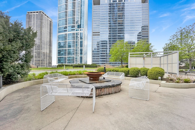 view of property's community with a patio area