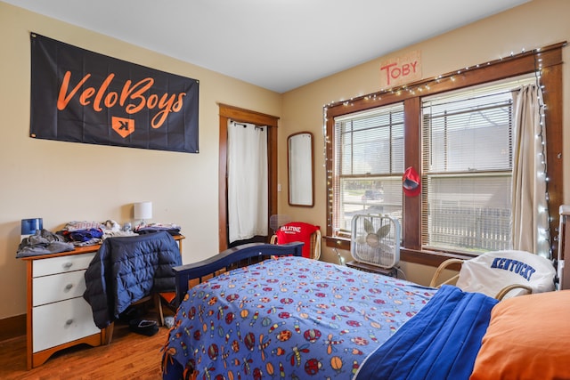 bedroom featuring hardwood / wood-style floors