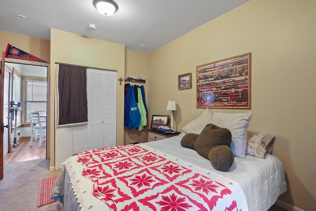 bedroom featuring a closet and carpet floors