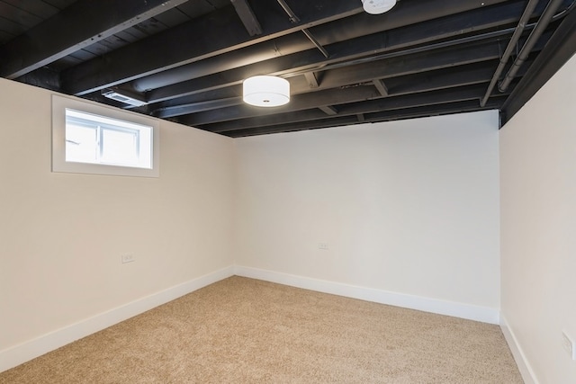 basement featuring carpet